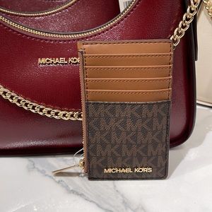 Michael Kors Jet Set Travel Medium Top Zip Card Case Wallet

Brown 
NWT